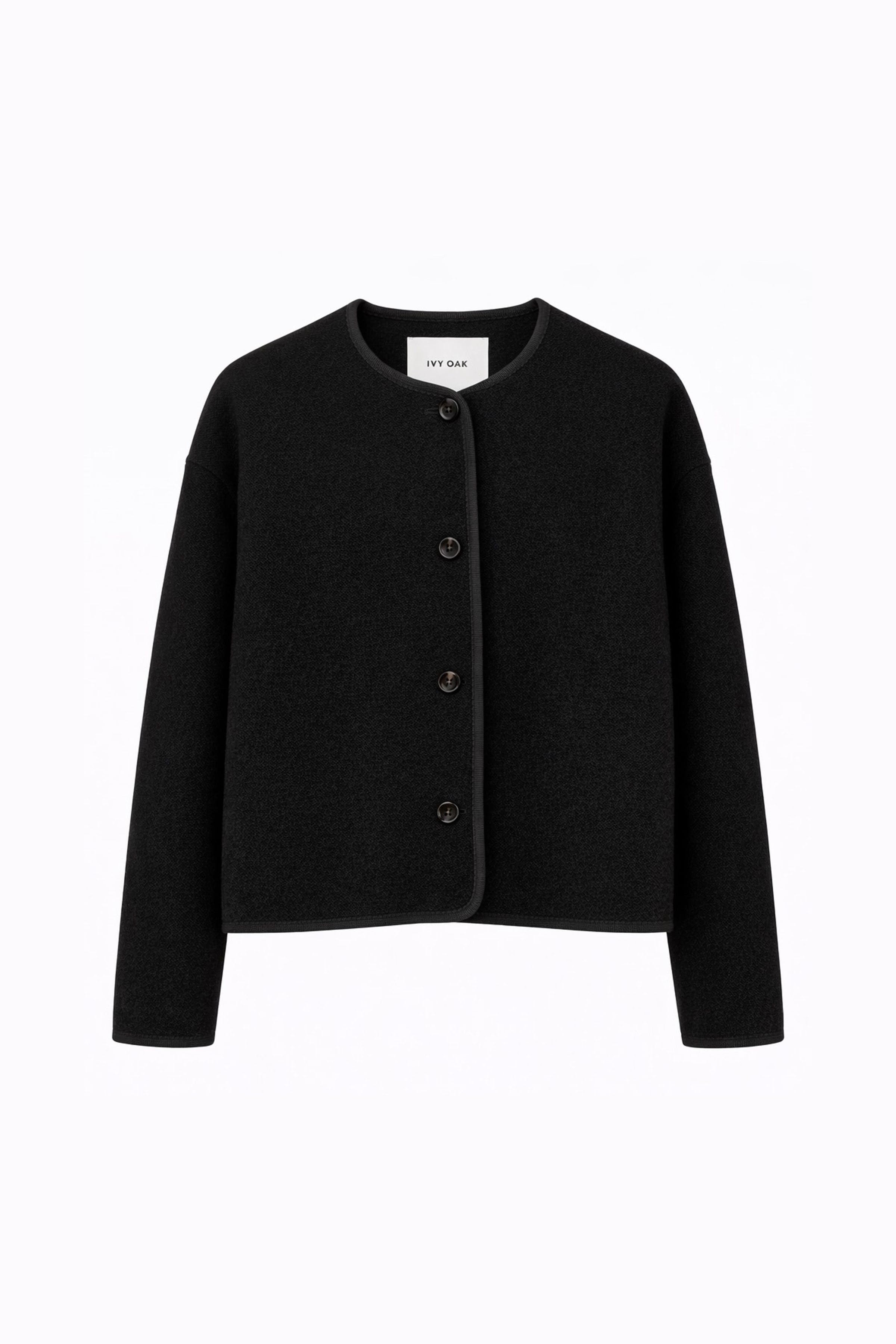 IOJuventa Outerwear PACK FRONT 30600104-BK999