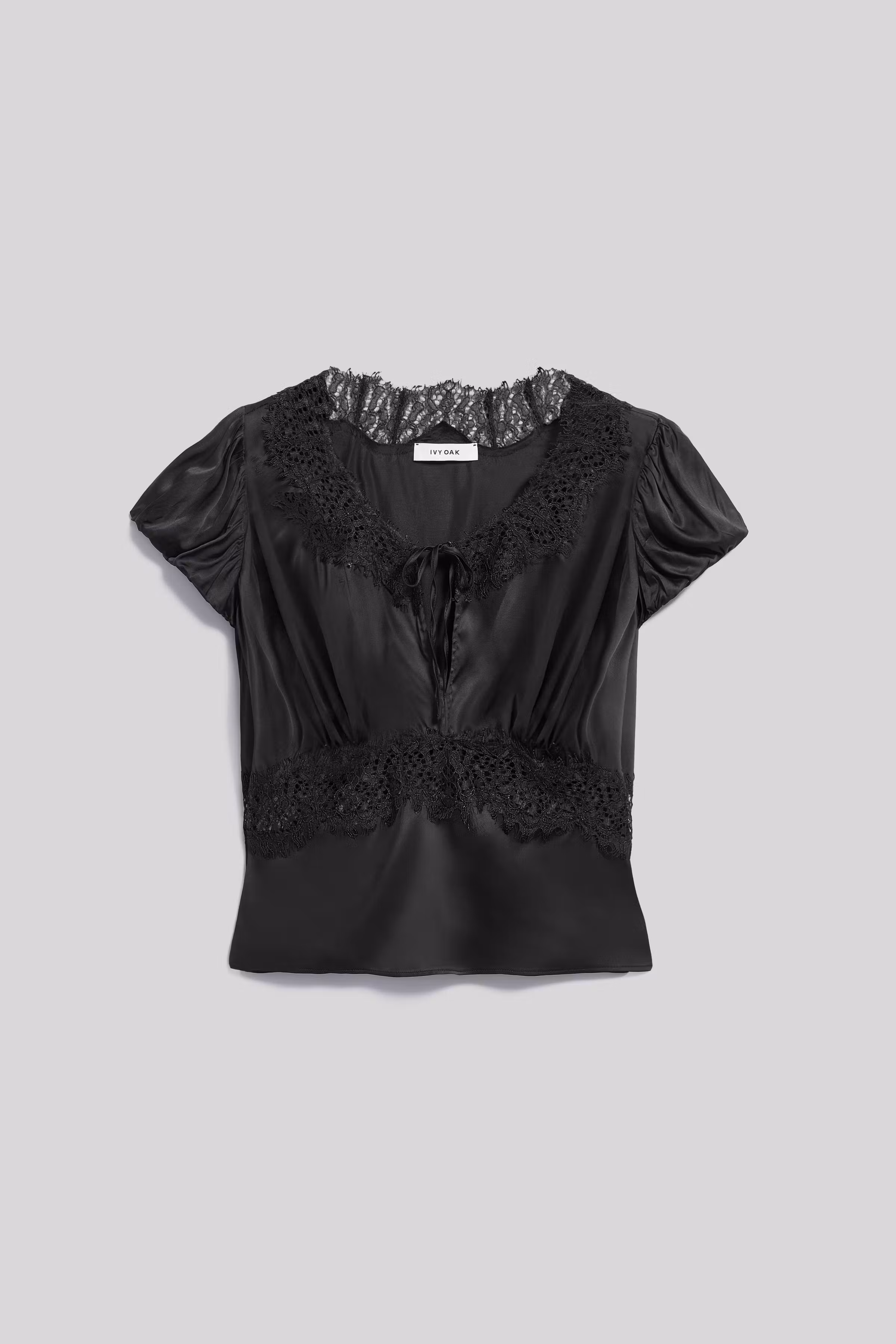 IOEfia Top PACK FRONT 30600069-BK999